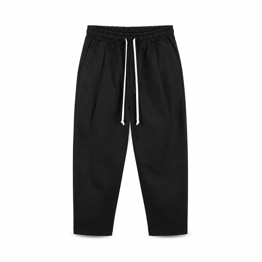 Fotografie de catalog a modelului: pantaloni bărbați carrot fit din bumbac – negri.