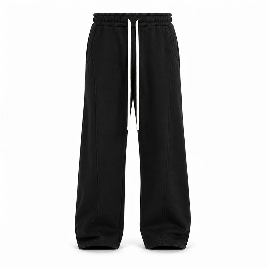 Fotografie de catalog a modelului: pantaloni bărbați negri baggy fit din bumbac.