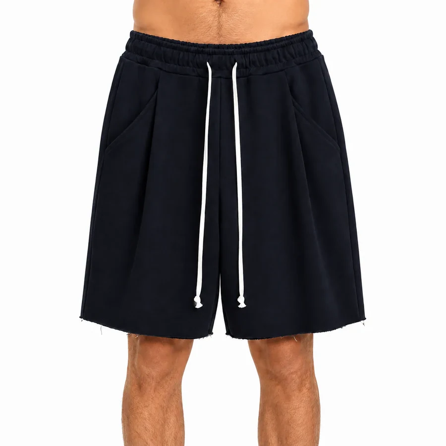 Fotografie de catalog a modelului: pantaloni bleumarin oversized cu cusătură frontală și șnur lung.