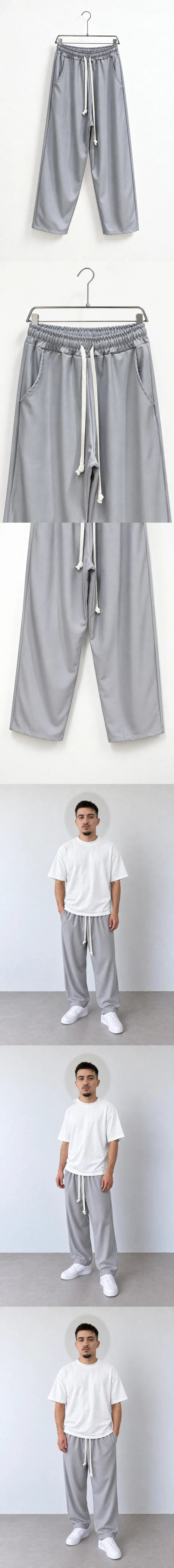 Pantaloni Bărbați Gri Deschis Largi cu Șnur Lung — pantaloni largi pentru bărbați gri deschis cu șnur lung, vedere oblică pe umeraș — cadrul 2 din galeria editorială.