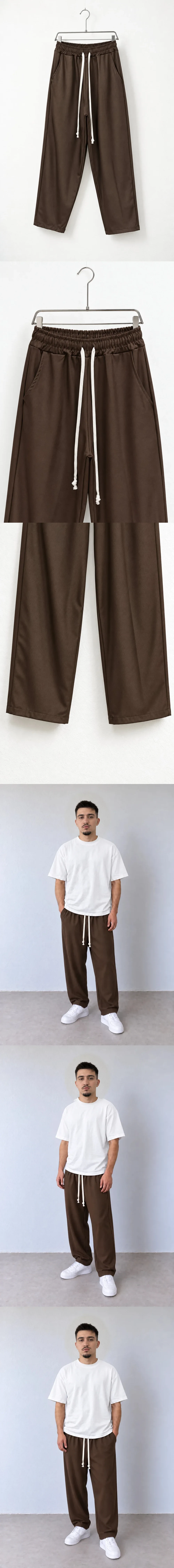 Pantaloni Bărbați Maro Închis Largi cu Șnur Lung — pantaloni largi pentru bărbați maro închis cu șnur lung, vedere oblică pe umeraș — cadrul 2 din galeria editorială.