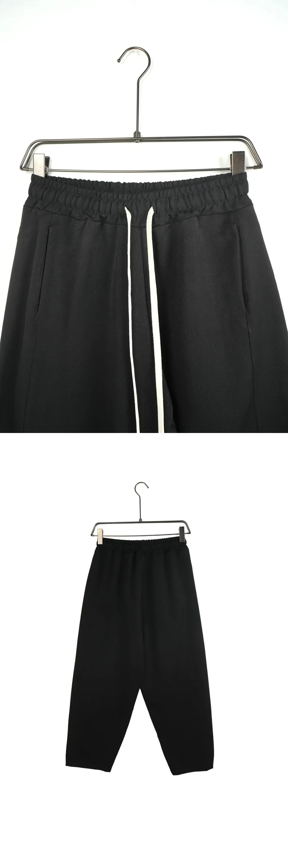 Pantaloni lungi largi bărbați casual negrii cu șnur — pantaloni casual negri cu talie elastică și șnur, croială largă și comodă — cadrul 2 din galeria editorială.