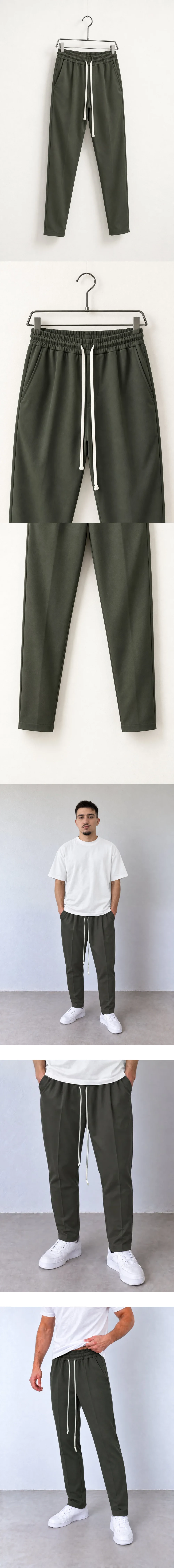 Pantaloni Slim Bărbați Verde Militar cu Șnur Lung — pantaloni slim verde militar pe umeraș — cadrul 2 din galeria editorială.