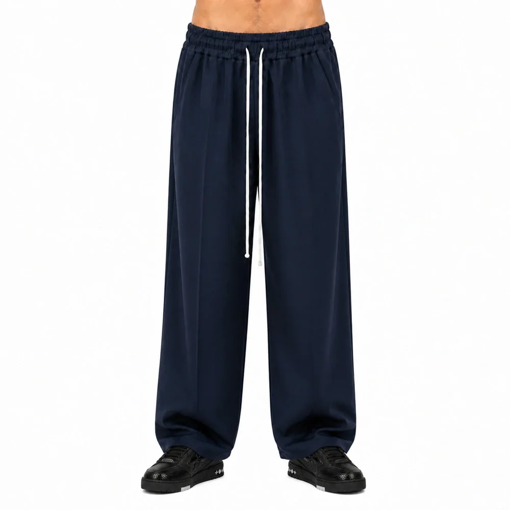 Pantaloni Wide Leg Bărbați Bleumarin cu Șnur Lung — pantaloni wide leg bărbați bleumarin, purtați de model, vedere frontală — cadrul 2 din galeria editorială.