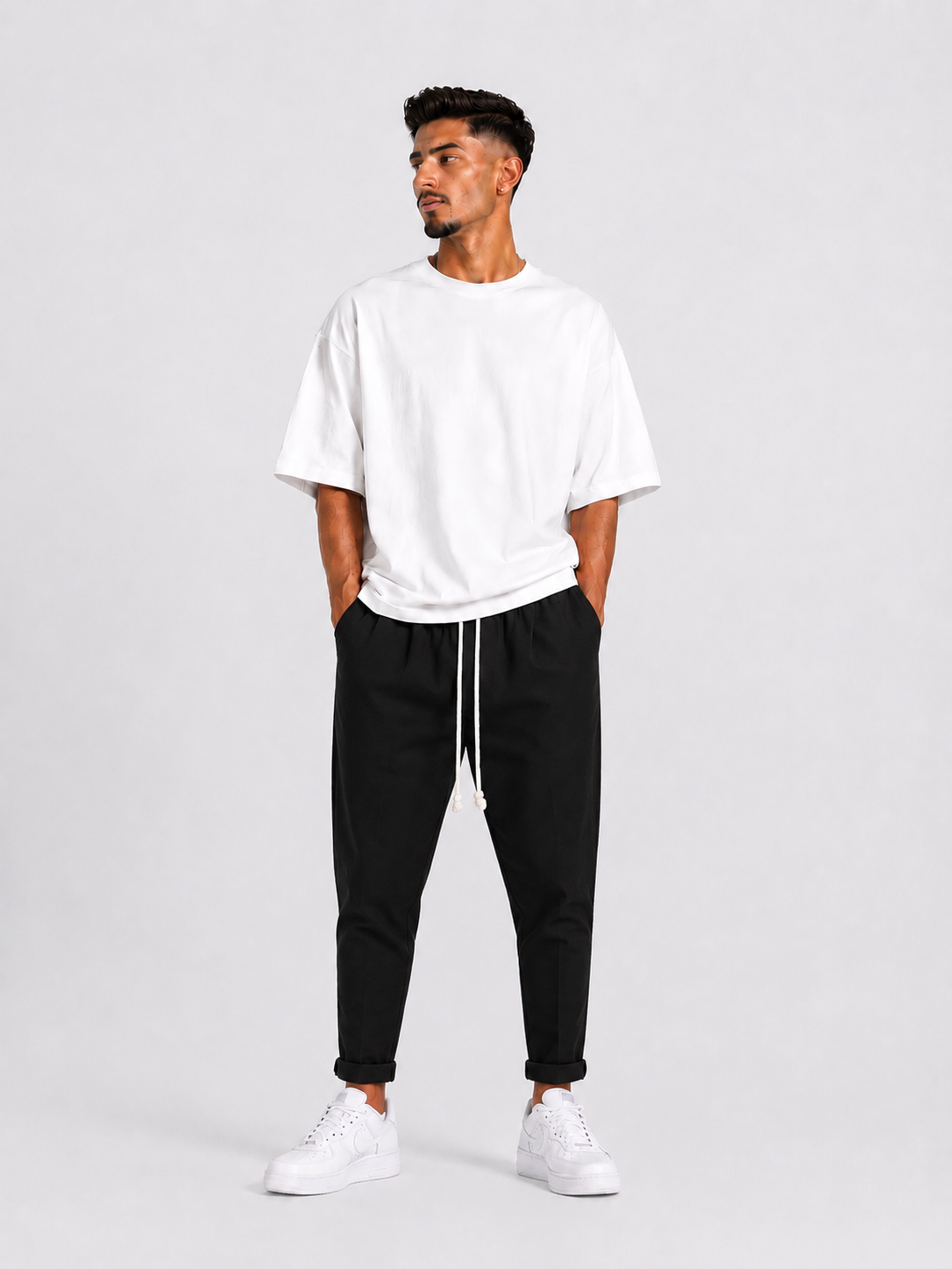 pantaloni barbati negri casual snur model barbat pantaloni negri slim casual Atelier AXD in tinuta moda urbana cu snur lung vizibil