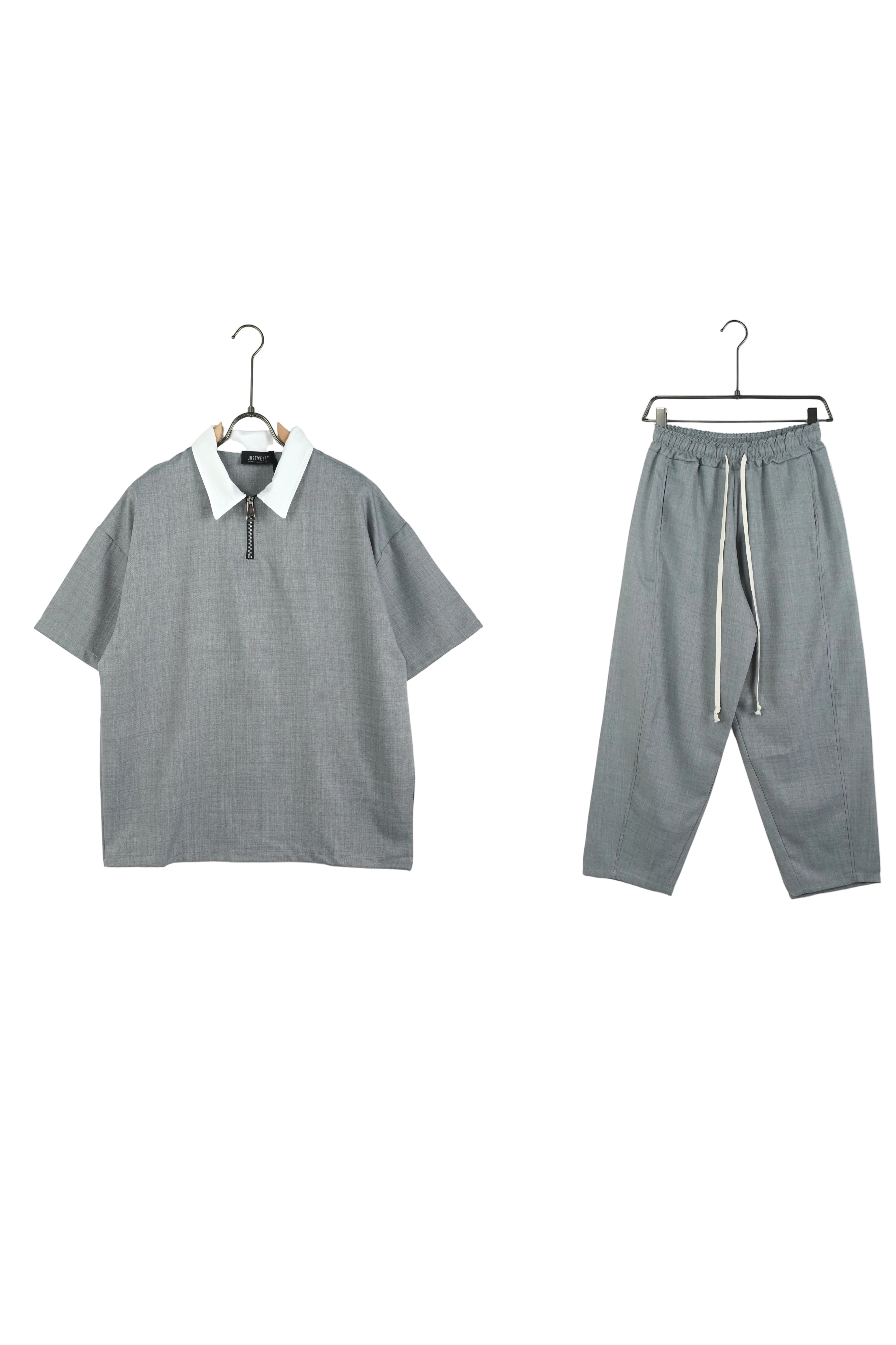 pantaloni cu snur lung atelier axd tinuta gri larga fermoar si sire Atelier AXD in tinuta moda urbana cu snur lung vizibil