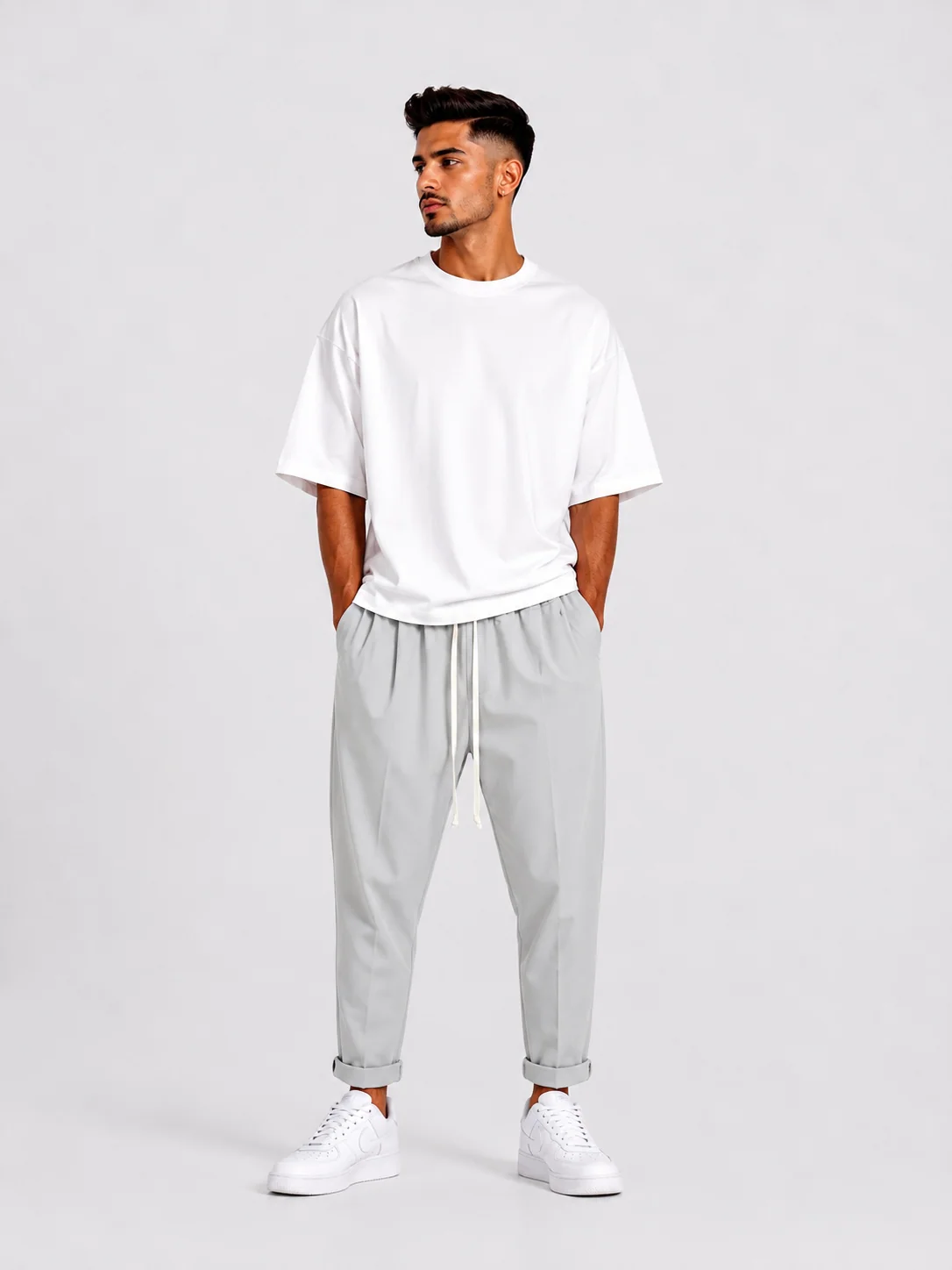pantaloni cu snur lung purtati de persoana reala pentru Pantaloni albi cu snur lung: ghid vizual, tinuta completa in context urban stil Atelier AXD